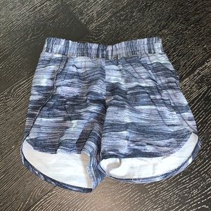 Blue athletic shorts with built in underwear